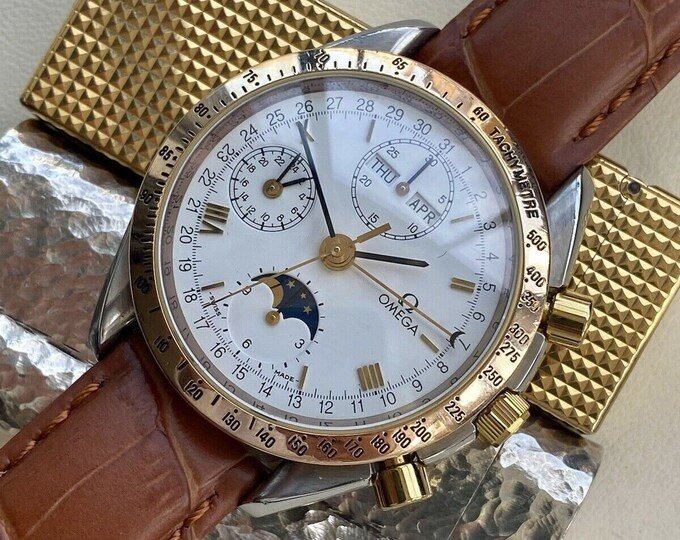 1990s Omega steel and gold moonphase.jpg